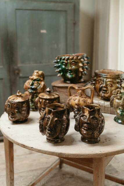 collection of glazed terra cotta grotesque jugs and bowls ...