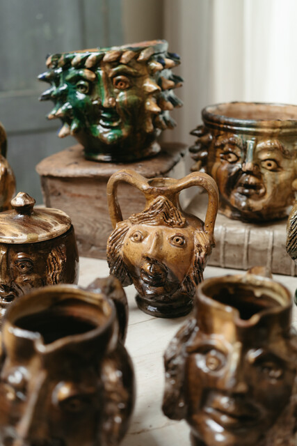 collection of glazed terra cotta grotesque jugs and bowls ...