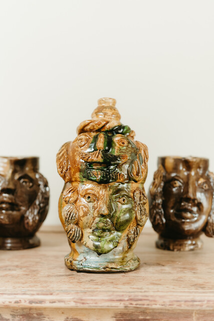 collection of glazed terra cotta grotesque jugs and bowls ...