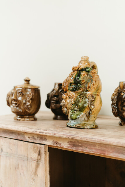 collection of glazed terra cotta grotesque jugs and bowls ...