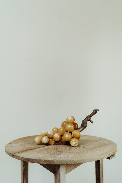 Italian alabaster grapes ... covered with yellow varnish...