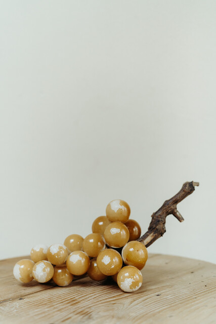 Italian alabaster grapes ... covered with yellow varnish...