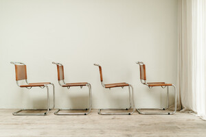 Set of 4 chrome and cognac colored leather vintage chairs .. 