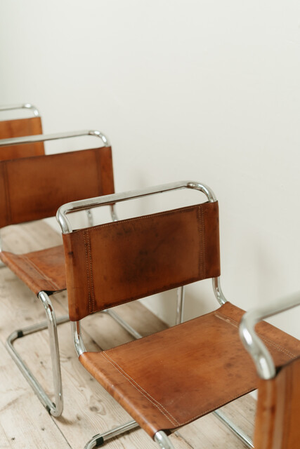 Set of 4 chrome and cognac colored leather vintage chairs .. 