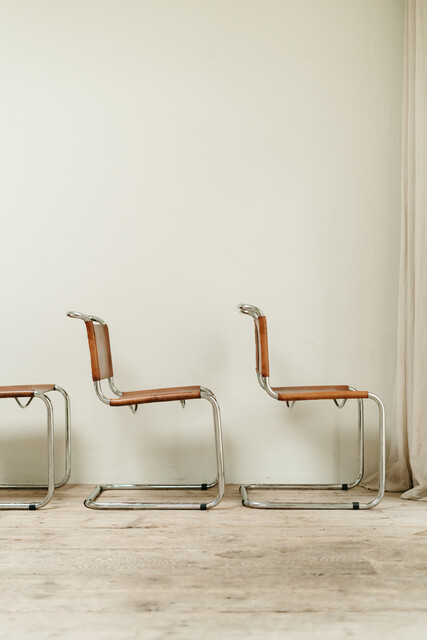 Set of 4 chrome and cognac colored leather vintage chairs .. 