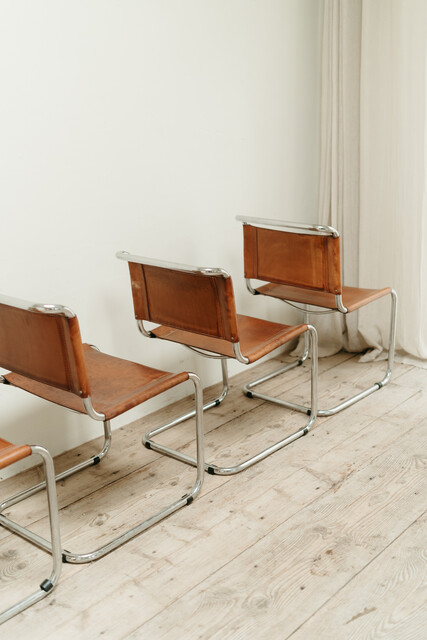 Set of 4 chrome and cognac colored leather vintage chairs .. 