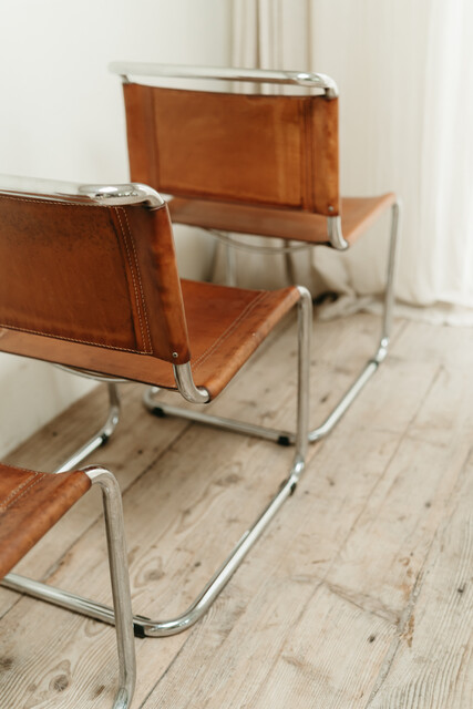 Set of 4 chrome and cognac colored leather vintage chairs .. 