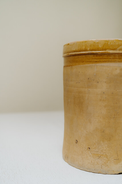 yellow glazed terra cotta vase 